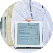 Doctor holding out white medical tablet with STD testing results for patient