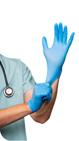 Medical provider with a stethoscope pulling a blue medical glove over his left hand